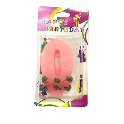 Свічка - цифра "0" рожева з глітером D-050